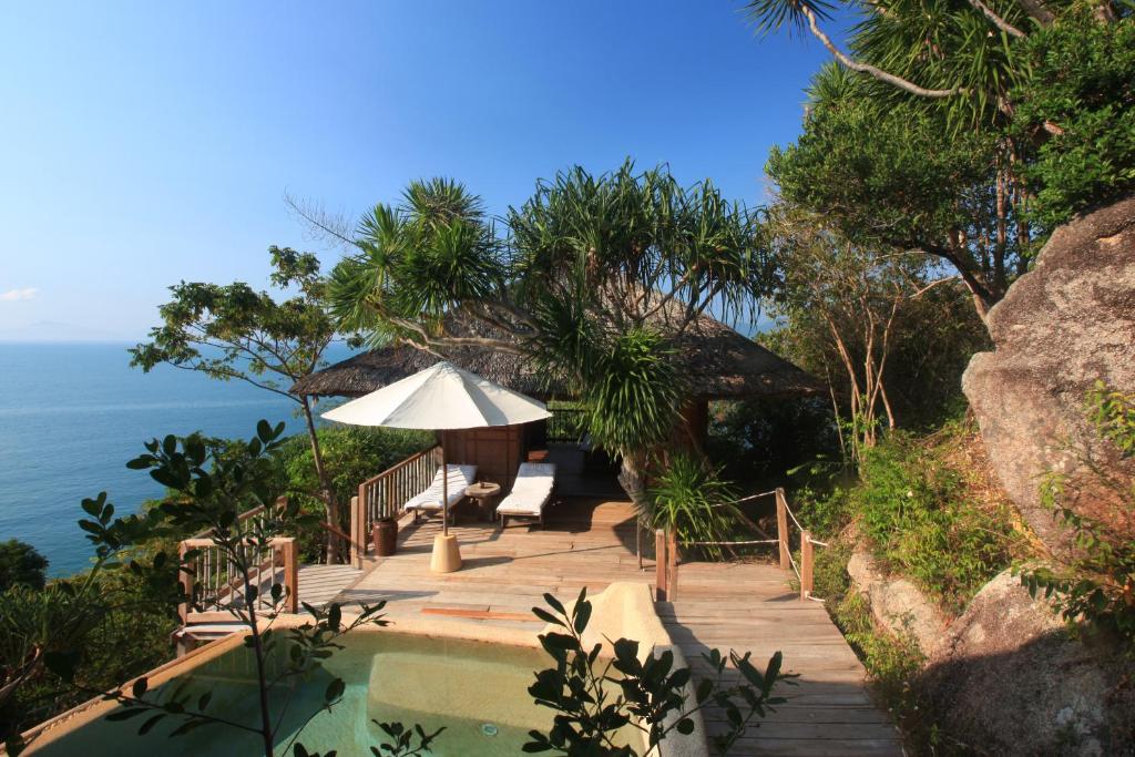 Nestled on a dramatic peninsula overlooking the serene Ninh Van Bay